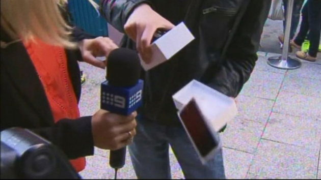 1 large iPhone 6 Dropped  Literally First Person to Buy iPhone 6 Drops it On Live TV
